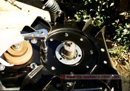 Remove spin brake housing bolts